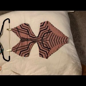 Pink and black one piece